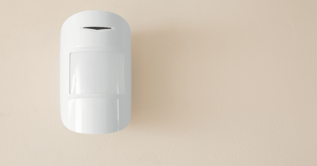 Motion Sensor on Beige Wall