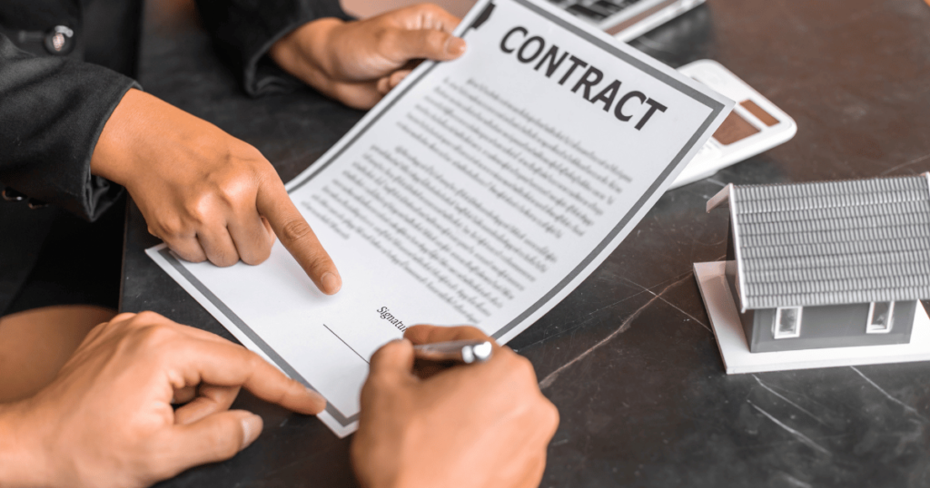 Person Signing a Contract