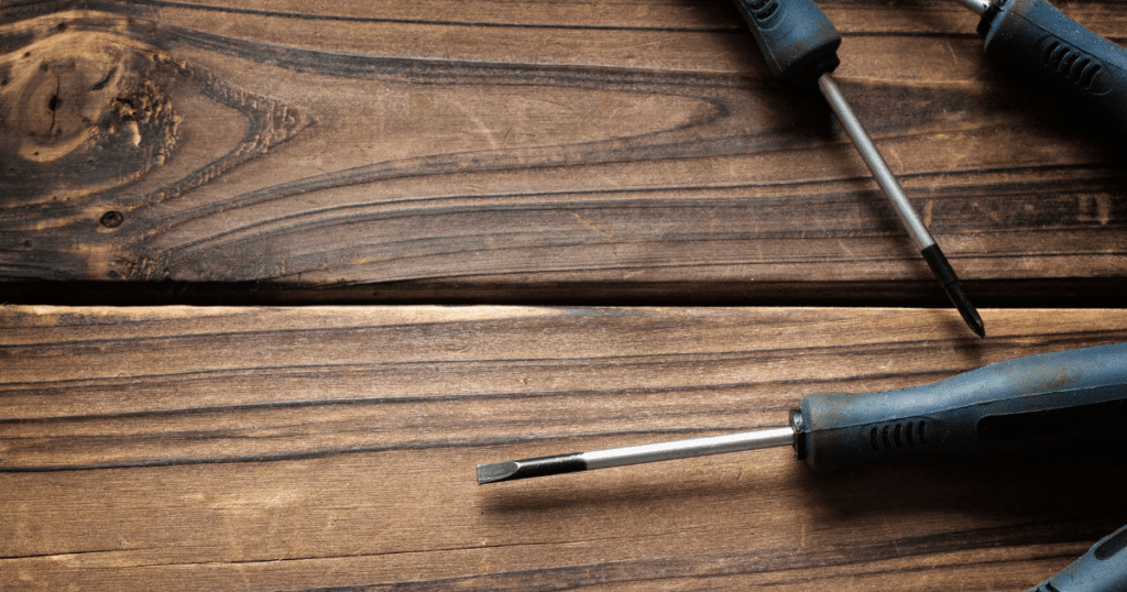 Small Screwdrivers on Wood Table