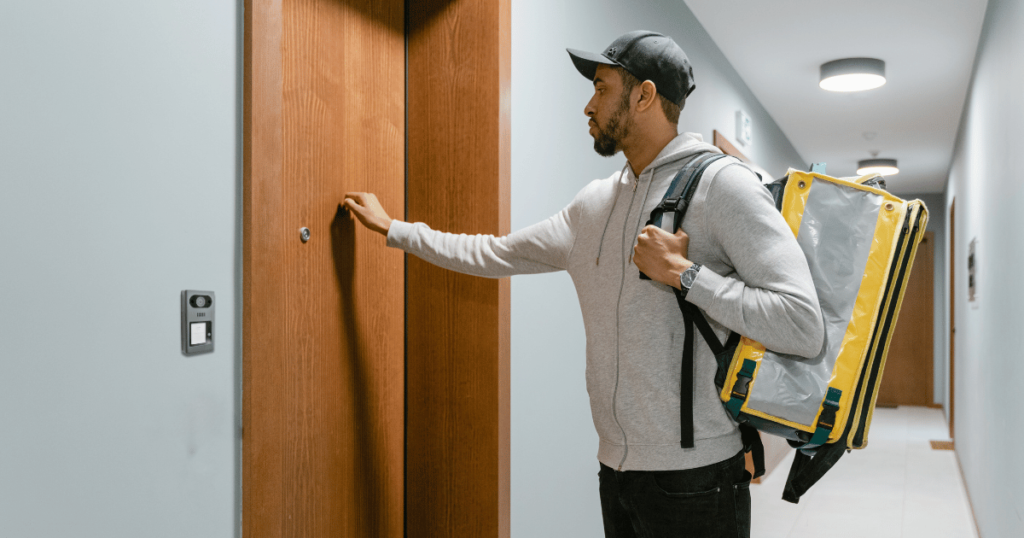 person knocking on door